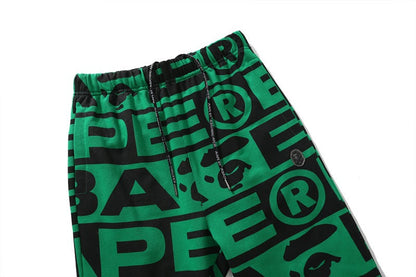 BAPE All over letter print sweatpants