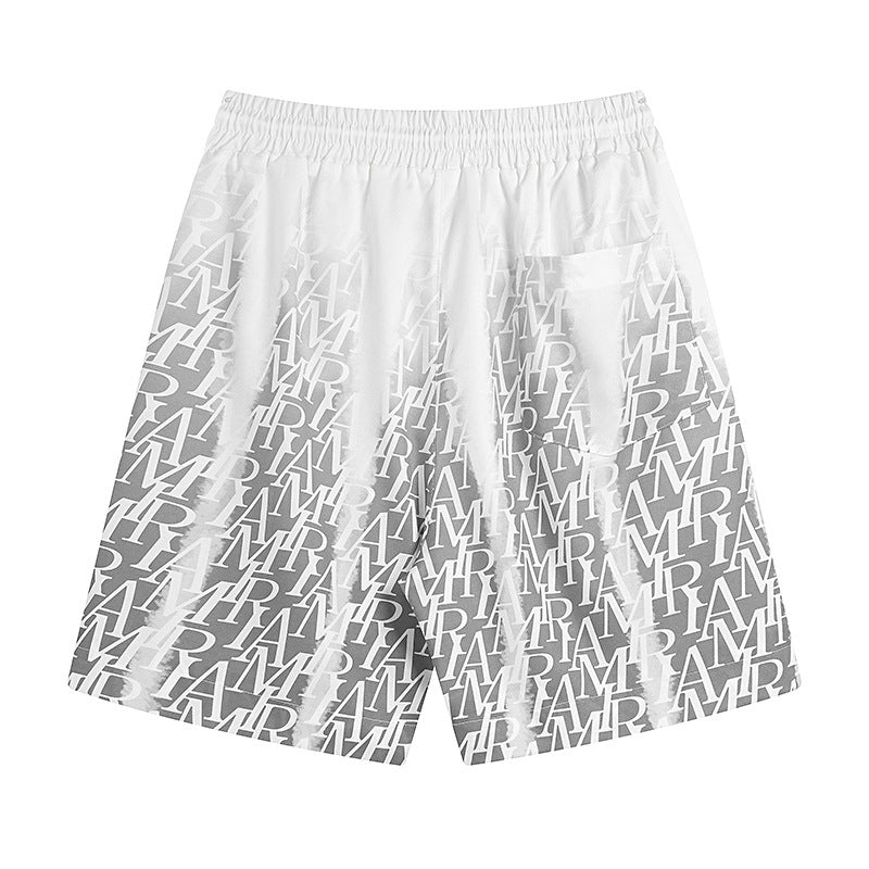 AMIRI logo-print gradient silk shorts